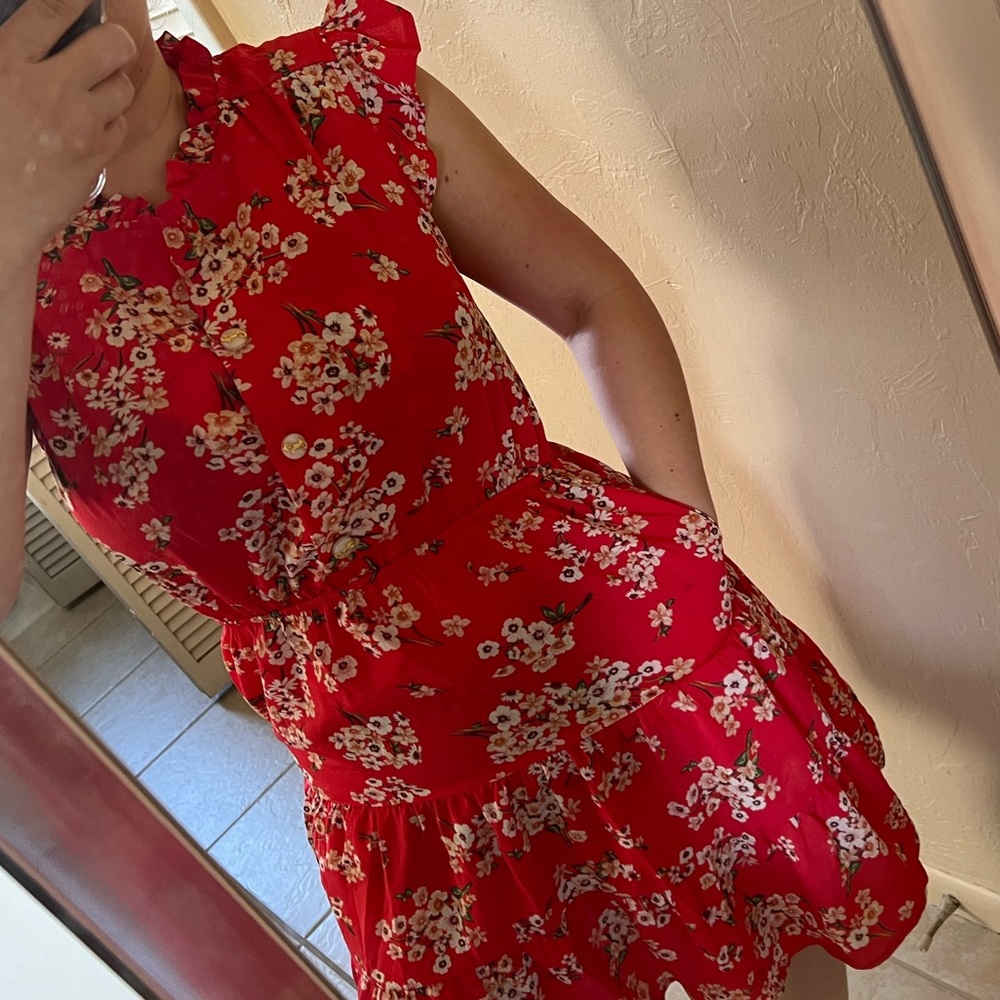 Super cute with pockets sun dress. The material is higher quality and NWT